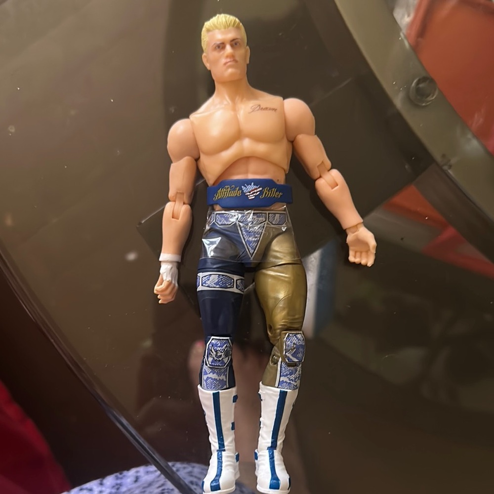 Blue and Gold Action Figure with Articulated Joints